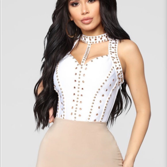 white and gold bodysuit